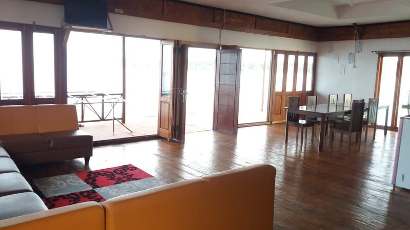 The open lounge and restaurant overlooking the water
